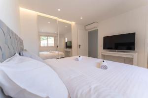 Appartements Magnifique appartement vue mer, piscine, garage : photos des chambres