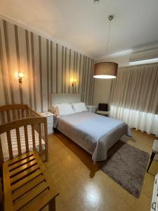 Double Room with cot room in Solar S.Bento