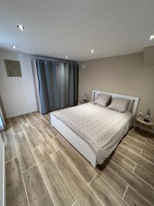 Appartements Appartement T2 avec jardin : photos des chambres
