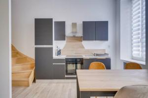Appartements Les merveilles de la palmyre : photos des chambres