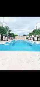 Coqueto apto en Punta Cana frente a la piscina Cap Cana - Laguna Hoyo Claro