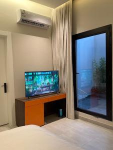 Cosy studio in Al Malqa with terrace, Prime location, Self Check-in