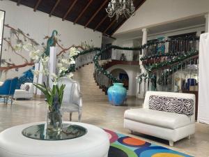 Hotel y villas palma Real .