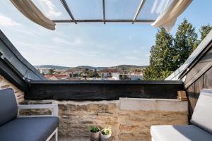 Appartements Triplex de Charme : Terrasse/Vue Panoramique : photos des chambres