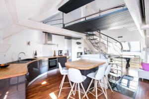 Appartements Triplex de Charme : Terrasse/Vue Panoramique : photos des chambres