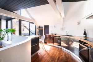 Appartements Triplex de Charme : Terrasse/Vue Panoramique : photos des chambres