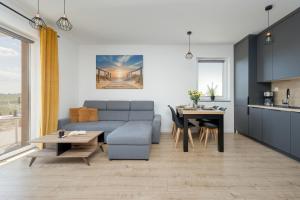 Nadmorski Apartament z Parkingiem w Ustroniu Morskim by Noclegi Renters