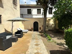 Casa junto a la Alhambra con vistas y jardín privado