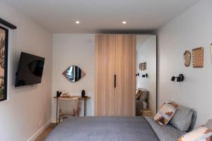 Appartements Rez de chausse dans une rue pavee 4 pers Nation : photos des chambres