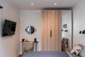 Rez de chausse dans une rue pavee 4 pers Nation