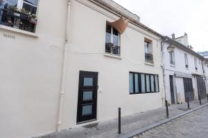 Appartements Rez de chausse dans une rue pavee 4 pers Nation : photos des chambres