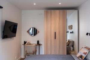 Appartements Rez de chausse dans une rue pavee 4 pers Nation : photos des chambres