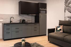 Appartements Rez de chausse dans une rue pavee 4 pers Nation : photos des chambres