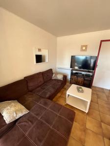 Appartements Bel appartement avec piscine : photos des chambres