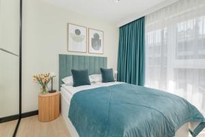 Gustowny Apartament z Parkingiem i Balkonem w Kolobrzegu by Noclegi Renters