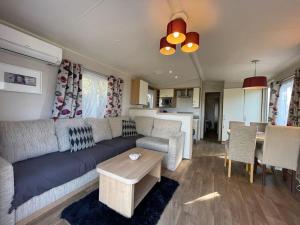 Appartements Bungalow vue mer / Terrasse panoramique / parking : photos des chambres