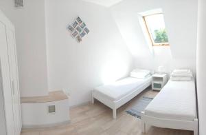 Apartamenty i domki na Jantarowej