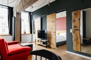 Two-Bedroom Apartment room in FELIX Suiten im Lebendigen Haus am Augustusplatz