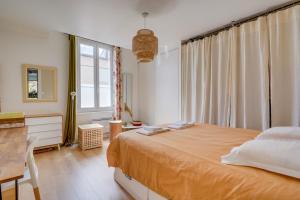 Appartements Tres bel appartement avec Terrasse et Jardin : photos des chambres