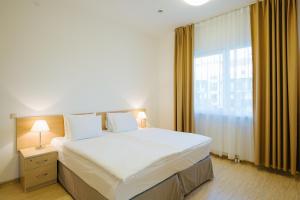 Two-Bedroom Apartment room in ApartHotel Imeretinsky - Parkovy Kvartal