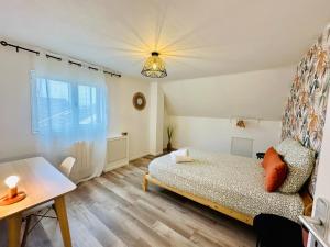 Maisons de vacances Maison Le M - Disneyland Parking : photos des chambres