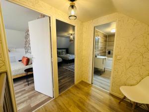 Maisons de vacances Maison Le M - Disneyland Parking : photos des chambres
