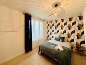 Maisons de vacances Maison Le M - Disneyland Parking : photos des chambres