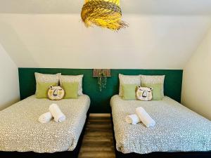 Maisons de vacances Maison Le M - Disneyland Parking : photos des chambres