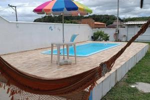Casa em Unamar com piscina privativa