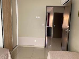 Appartements ARGELES sur MER APPT ETAGE CALELLA TOUT CONFORT JARDIN PISCINE PARKING WIFI : photos des chambres