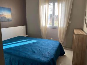 Appartements ARGELES sur MER APPT ETAGE CALELLA TOUT CONFORT JARDIN PISCINE PARKING WIFI : photos des chambres