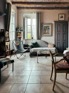 Sejours chez l'habitant Casaluna, chambre climatisee dans maison de village : photos des chambres