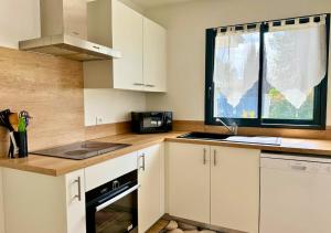 Maisons de vacances Moderne entre lac et ocean : photos des chambres