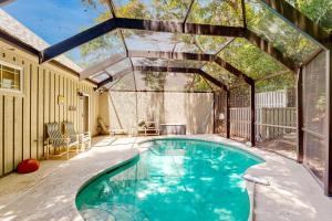 Spacious home with patio, deck, private outdoor pool, & beach access