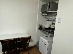 Chalé 02 com mini cozinha no coração de Penedo