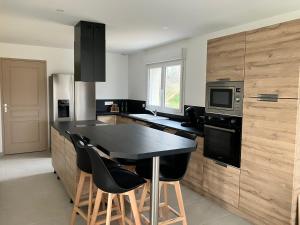 Maisons de vacances Au pied des batteries : photos des chambres