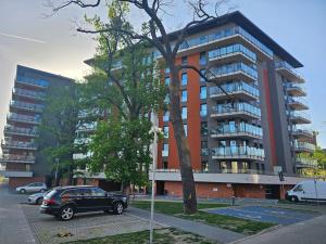 Apartament przy Loftach u Scheiblera parking podziemny, Śniadaniownia