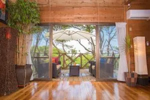 ダイナミックオーシャンビューを堪能できる自然の中のログハウス - Sugā