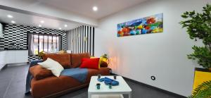 Appartements Duo : Ambiance rebelle et zen, proche RER C & Orly : photos des chambres