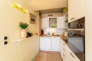 Appartements LA CASA AP4409 By Riviera Holiday Homes : photos des chambres