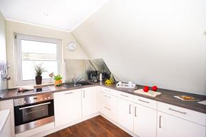 Ferienhaus Auszeit - Wohnung "Meeresbrise"