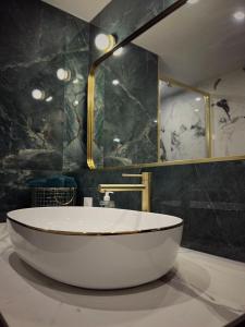 Appartements Suite Le Panoramique Near Disneyland : photos des chambres