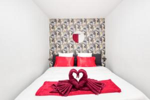 Appartements La belle Hirondelle - Love Room Jacuzzi : photos des chambres