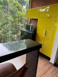 Chalé 10 com cozinha próx ao centro