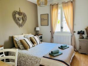 Maisons de vacances Le 4 Maison de charme proche de la plage wifi : photos des chambres