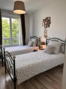 Appt à 10 min de Paris, 15 min a pied du SDF