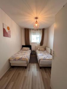 Appt à 10 min de Paris, 15 min a pied du SDF