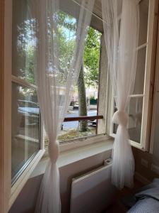 Appartements Charme et Confort : T2 Lumineux : photos des chambres