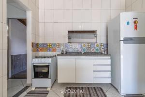 Apartamento com Piscina e Churrasqueira PDL005