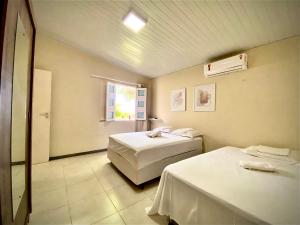 242 Casa da Praia em Condomínio Frente Mar